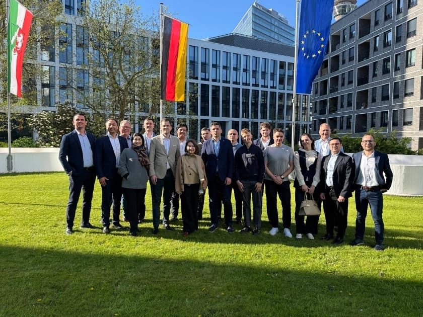 Moldovan IT delegation with European flags